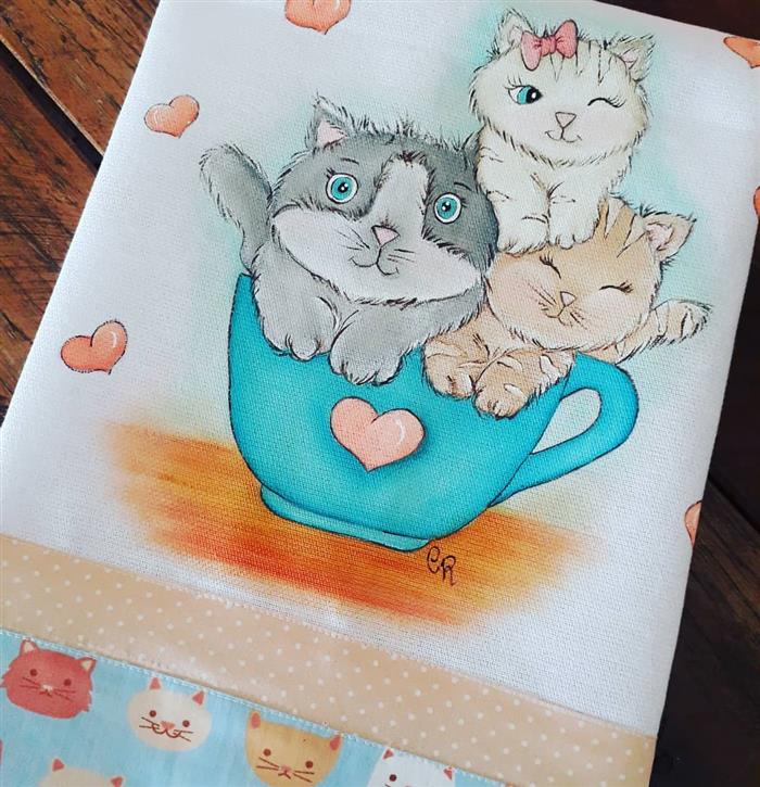 pintura sobre gatos de trapo