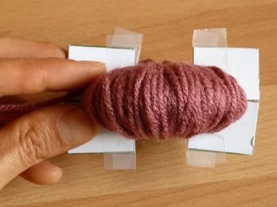 como hacer pompones de lana